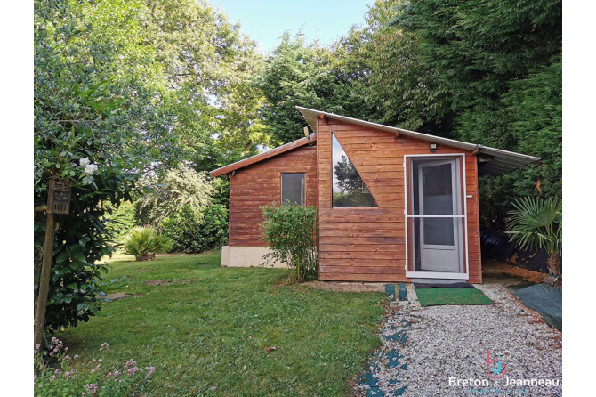 Single-storey house with studio in Saint-Cyr-en-Pail