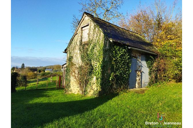 Maison style longère proche de Sillé le Guillame